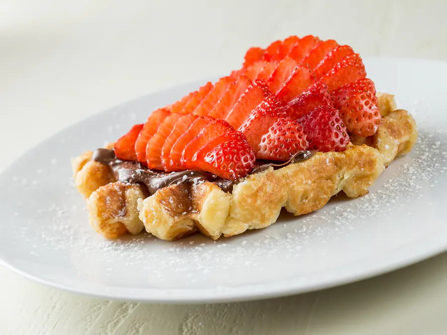 Liège waffle with Nutella and fresh organic strawberries